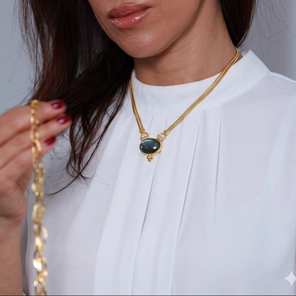 Woman's  gold chain necklace with a labradorite stone handcrafted at RM Kandy