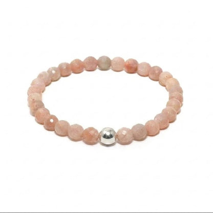 Women's Moonstone beaded bracelet with a polished silver charm accent handmade at RM Kandy