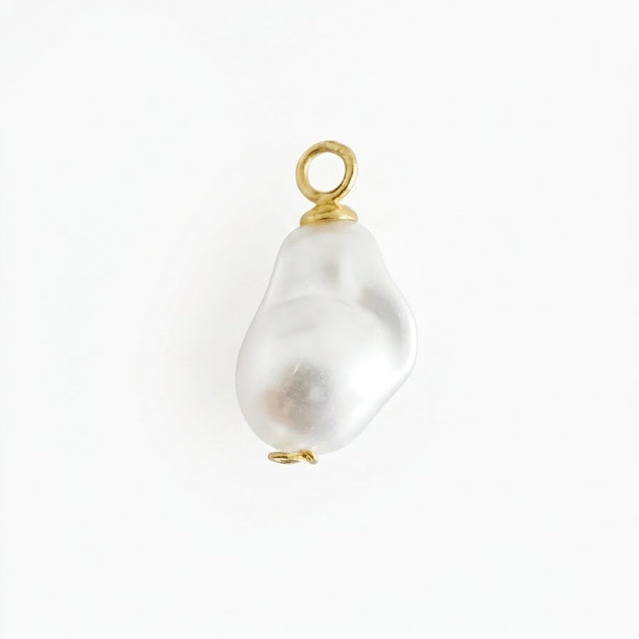 A single irregular baroque pearl pendant with a gold-tone loop at the top for women at RM Kandy