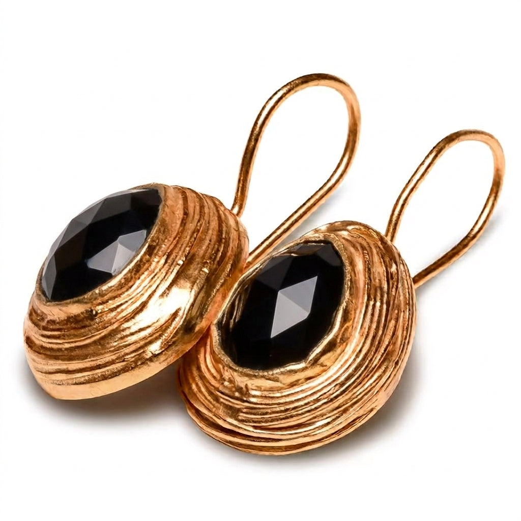 Women's gold onyx drop earrings with textured oval settings wire clasp at RM Kandy.