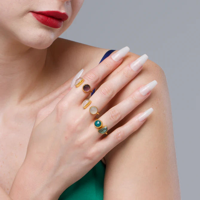 Woman wearing multiple cocktail adjustable rings on her fingers semi precious stones RM Kandy