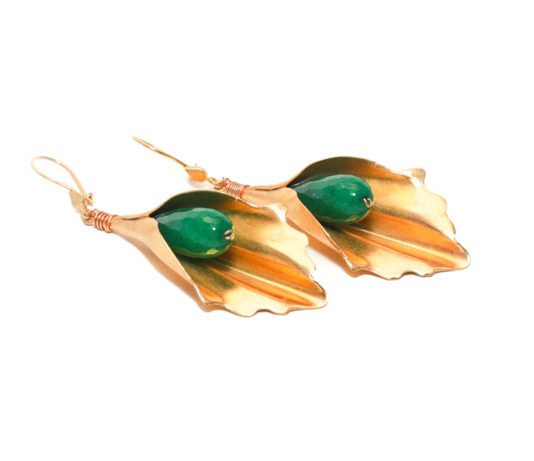 Women's jade stone embedded inside large gold leaf design earrings at RM Kandy